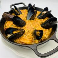 Seafood Risotto  · Arborio rice, shrimp, mussels, calamari, sofrito, saffron broth
