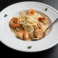 Shrimp Scampi · Jumbo shrimp sauteed in a garlic butter, sherry wine sauce, with parsley and basil.