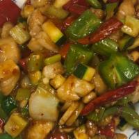 Kung Pao Seafood · Stir fried seafood with bell pepper, onion, zucchini, water chestnut, peanut in a garlic bro...