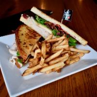 The Carnegie · Deli-style favorite served with turkey, swiss, sundried tomatoes, Applewood bacon, lettuce, ...