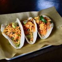 Baja Beer Project Tacos · Choose between three of our boom boom shrimp, blackened chick, or ground beef tacos, topped ...