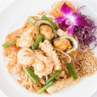 B1. Pad Thai · Stir fried with thin rice noodles with egg, sweet radish, green onion, bean sprouts and side...