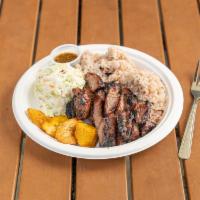 Kingston Special - Jamaican Jerk Pork · Pork with authentic Jamaican jerk spice served with traditional Jamaican rice and peas cooke...