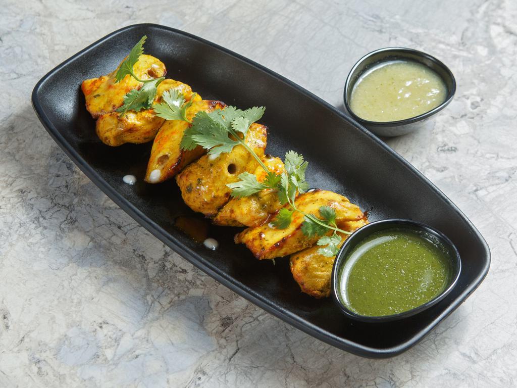 Chicken Tikka GF · Chicken breast marinated with Indian spices and cooked in tandoor oven served with mint chutney. 