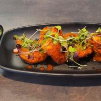 Tandoori Chicken GF · Chicken thigh meat marinated with Indian spices and cooked in tandoor oven served with mint ...