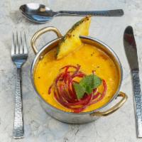 Chicken Pineapple Curry GF · A creamy pineapple curry loaded up with chopped peppers, onions, coconut and finished off wi...