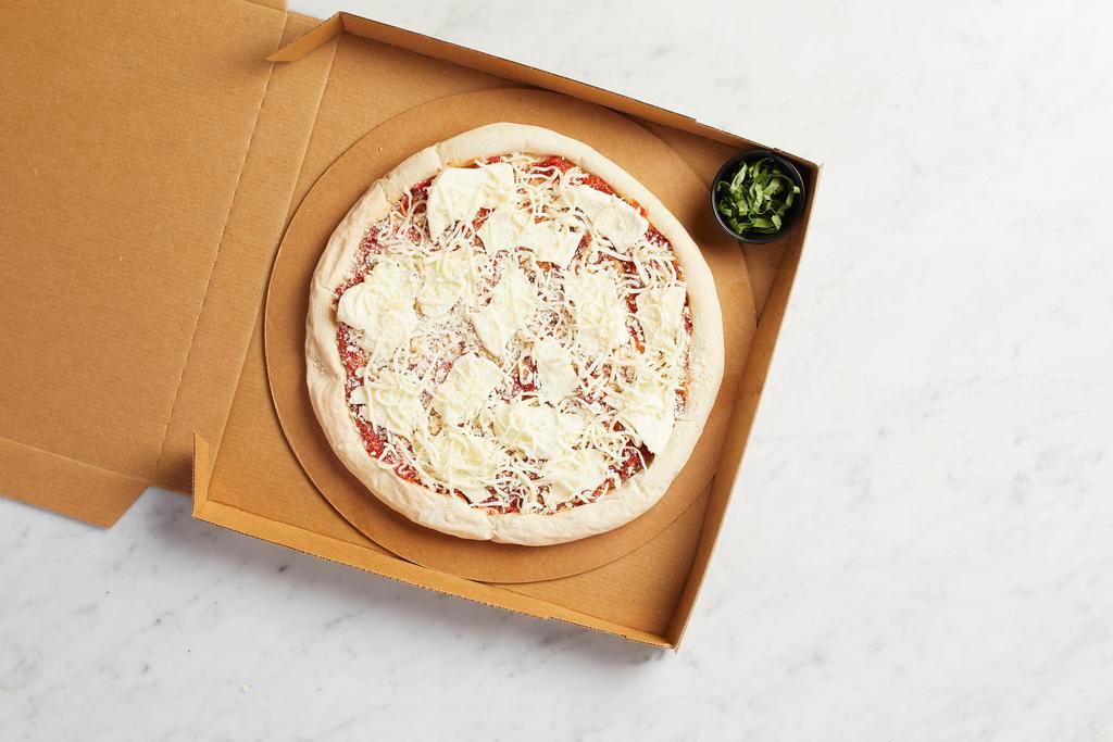 Take and Bake Margherita Pizza · READY TO BAKE - Italian tomatoes with fresh mozzarella, fresh basil and Parmesan. Vegetarian.