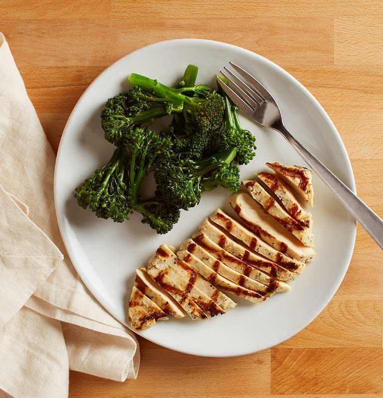 Kid's Grilled Chicken Breast · Served with baby broccoli. Includes choice of a fountain beverage, lemonade, apple juice, milk or chocolate milk.