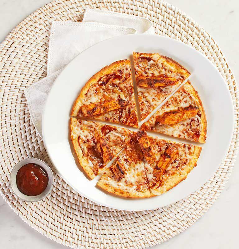 Kid's Validated Gluten-Free Original BBQ Chicken Pizza · BBQ sauce, chicken, and Mozzarella. This gluten-free pizza is prepared using the strict procedures approved by the Gluten Intolerance Group (GIG), using a validated gluten-free crust and other ingredients verified by our suppliers as gluten-free.