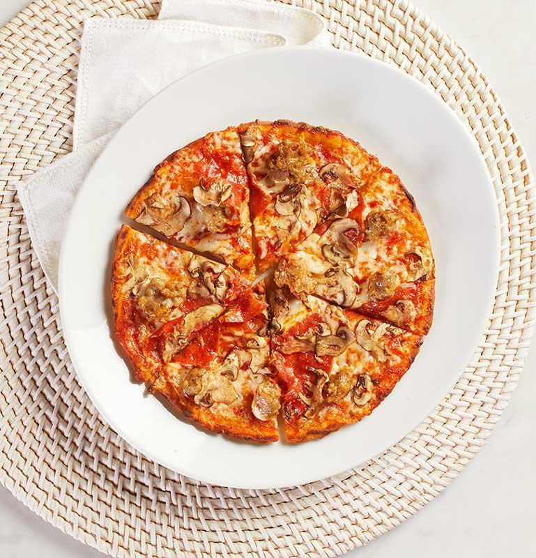 Kid's Validated Gluten-Free Mushroom Pepperoni Sausage Pizza · Mushrooms, pepperoni, Italian sausage, Mozzarella and tomato sauce. This gluten-free pizza is prepared using the strict procedures approved by the Gluten Intolerance Group (GIG), using a validated gluten-free crust and other ingredients verified by our suppliers as gluten-free.