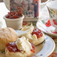 Traditional Scones · Two scones served with clotted cream and strawberry or raspberry jam. 
FOR LARGE ORDERS (MOR...