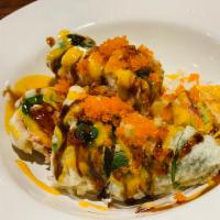 Jalapeno Bomb · Deep-fried jalapeno with spicy tuna, cream cheese, masago, eel sauce, and spicy mayo.