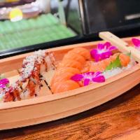 Omakase Deluxe (Chef's choice) · Salad, chef's choice of 7 pieces sushi, 7 pieces sashimi, and 2 choices of any chef's specia...