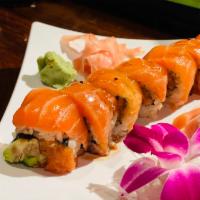 Loyal Salmon Roll · Spicy salmon, avocado inside, topped with fresh salmon and ponzu sauce. Spicy.