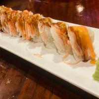 Shi Buya Roll · Shrimp tempura, avocado, jalapeno, cream cheese inside, topped with crab stick, eel sauce, s...