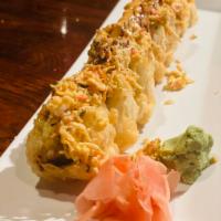 Las Vegas Roll · Spicy tuna, avocado, cream cheese and crab stick inside, topped with spicy crab, eel sauce a...