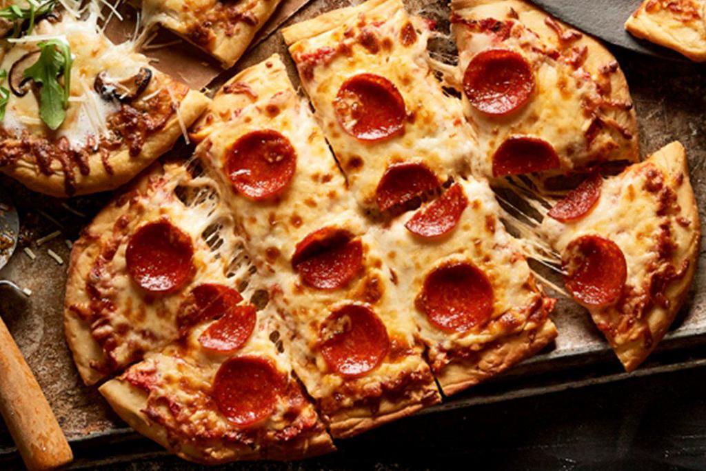 Classic Pepperoni · Sliced pepperoni, shredded mozzarella cheese, Parmesan, oregano, and robust tomato sauce.