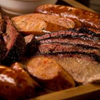 Sampler Platter (3 Meats) · Comes with three meats, two sides and choice of bread (Serves 1 Person)