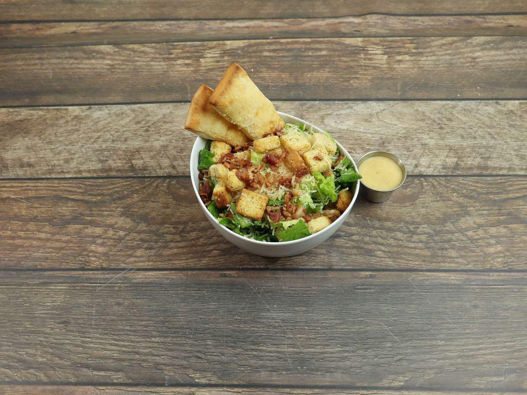 Classic Caesar Salad · Comes with 3 Caesar dressings on the side.