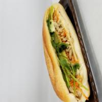 Chicken Banh Mi Sandwich · Comes with mayo, pate, cilantro, pickled carrots, jalapenos and cucumbers.