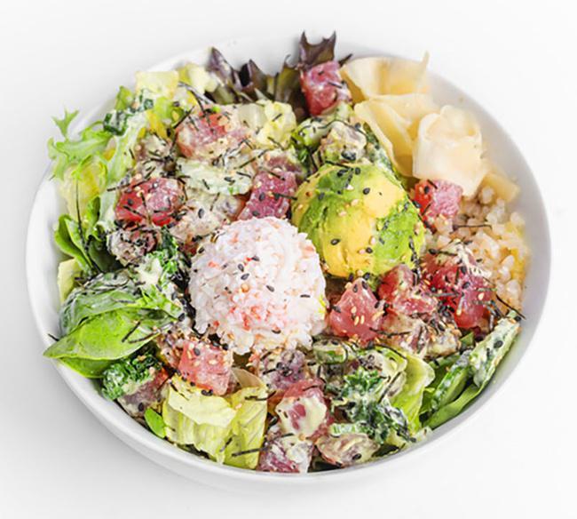 Keto Tuna Bowl · 496 cal | 35g protein | 22g carbs | 28g fat  A delicious poke bowl, with perfectly balanced nutritionals for someone eating on a keto diet, living a paleo lifestyle or just looking to cut a little carbs.  This healthy bowl begins with low carb cauliflower rice and mixed greens, topped with Ahi Tuna that is rich in protein and Omega-3 fatty acids, fresh scooped avocado packed with healthy fats, and finished with Pokeworks favorite toppings like surimi, shredded nori, bright pickled ginger and Serrano Aioli.