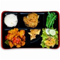 Orange Bento Box · Wok-fried, green and red bell pepper. Ginger salad, noodles, garlic string beans and your ch...