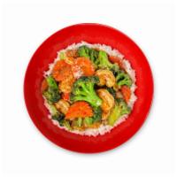 Garlic Broccoli Rice Bowl · Broccoli, carrot and soy garlic sauce served over your choice of white or brown rice.