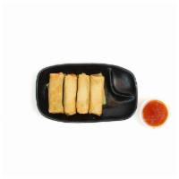Veggie Spring Rolls · Served with sweet chili sauce.