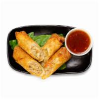 Pork Egg Rolls · Served with sweet chili sauce.