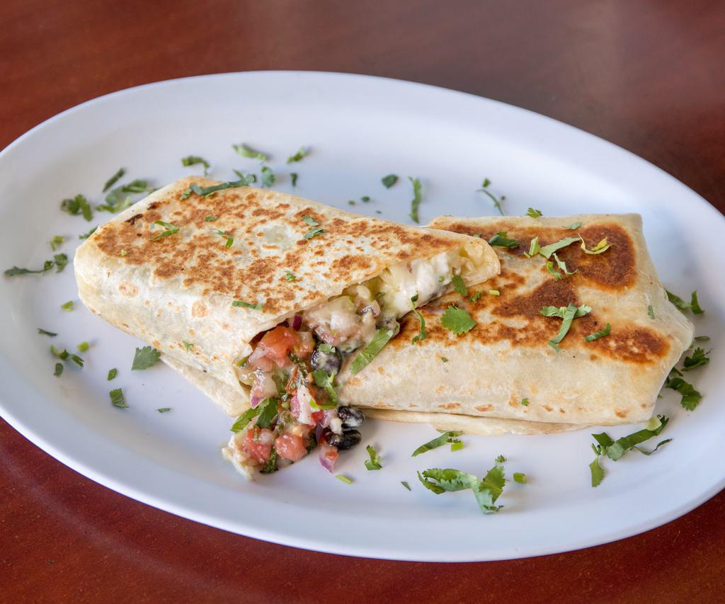 Regular Quesadilla · Choice of meat and cheese.