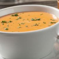 Lobster Bisque · A light cream lobster bisque with a touch of sherry
