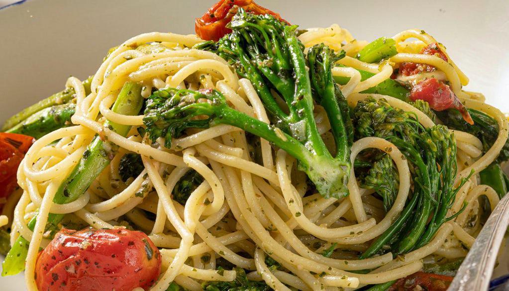 Pesto Primavera · Grilled asparagus, roasted grape tomatoes, broccolini®, spaghetti, house pesto sauce

