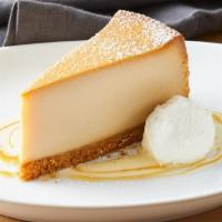 Caramel Mascarpone Cheesecake · Mascarpone cream, anglaise, caramel drizzle
