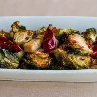 CRISPY BRUSSELS SPROUTS · bacon, Calabrian chili, red pepper jelly