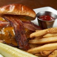 Bacon Cheddar Burger · 7 oz.  fresh USDA beef patty, aged cheddar, red leaf lettuce, red onion, beefsteak tomato, b...