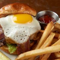 Sunny Side Up Burger · 7 oz. fresh USDA Prime beef patty, aged cheddar, mozzarella, caramelized onions, fried egg, ...