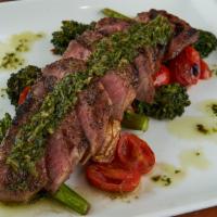 New York Strip Steak Entree · Grilled 8 oz. New York strip, broccolini, marinated grape tomato, fingerling potatoes, chimi...