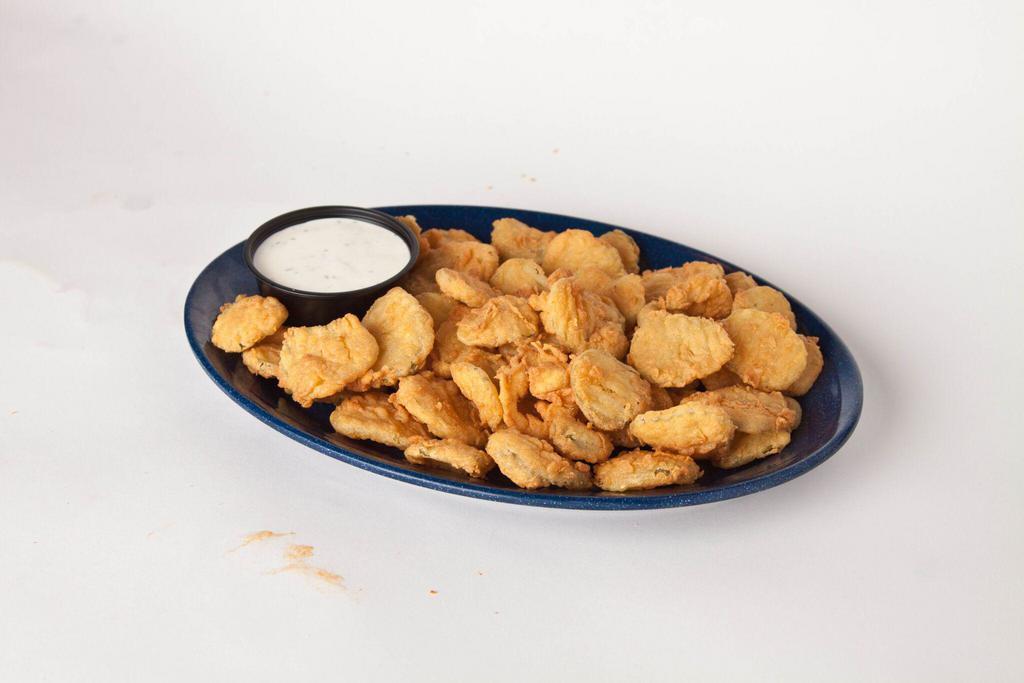 Pickle Chips · Crisp dill pickle chips hand-breaded and fried to a golden brown. Served with ranch dressing.