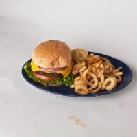1/2 lb. The Original Burger · Juicy thick burger served with lettuce, onion, tomato, and pickle.