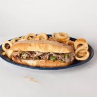 Philly Cheese Steak Sandwich · Tender and juicy! Philly steak grilled with onions, bell peppers and loaded with melted chee...