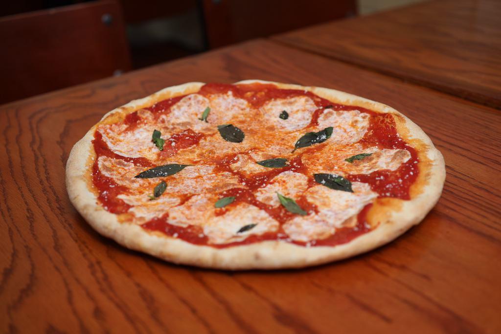 Margherita Pizza · Served as is, no modifiers.