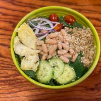 Iron Man Salad · baby kale, quinoa, artichoke, cannelloni beans, tomatoes, onions, cucumbers, sesame seeds, o...