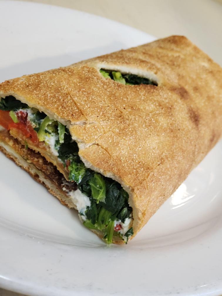 Vegetable Stromboli · Broccoli, spinach, eggplant, roasted peppers, ricotta & mozzarella cheese.
Served as is. No modifiers