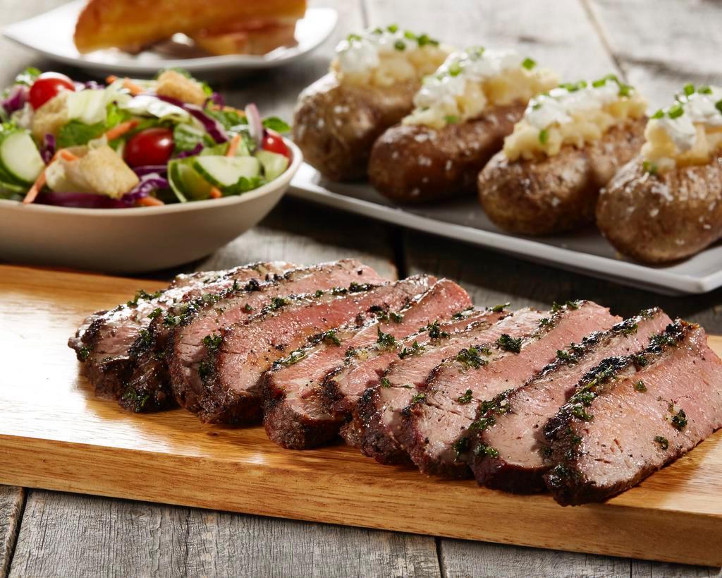 Sliced Grilled Tri Tip Family Meal · Our signature steak perfectly seasoned and full of flavor.