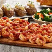 Grilled Shrimp Skewers Family Meal · All natural, wild caught jumbo shrimp. Served with 8 skewers.