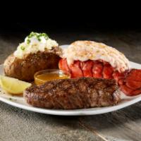 Steak & Lobster · Hand-cut, 6oz. steak paired with a 5-6oz lobster tail served with fresh cut lemon, drawn but...