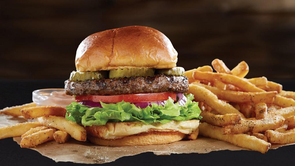 Sizzler Burger · One 1/3 patty. Bistro sauce, shredded lettuce, tomatoes, red onions and dill pickles on a delicious bun. Served with Idaho steak fries.
