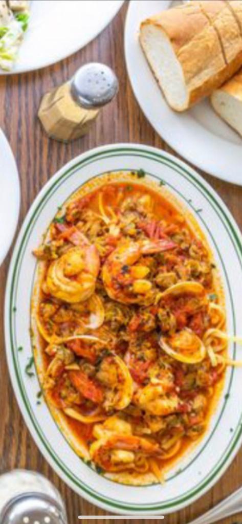Frutti di Mare · Shrimp, Clams, Calamari, Mussels. With choice of pasta and salad