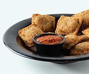 Toasted Ravioli · Ten oven toasted beef raviolis brushed with garlic butter and served with our house made red...