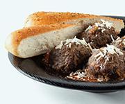 Meatballs · Four of our delicious house-made meatballs topped with Parmesan and served with our house ma...